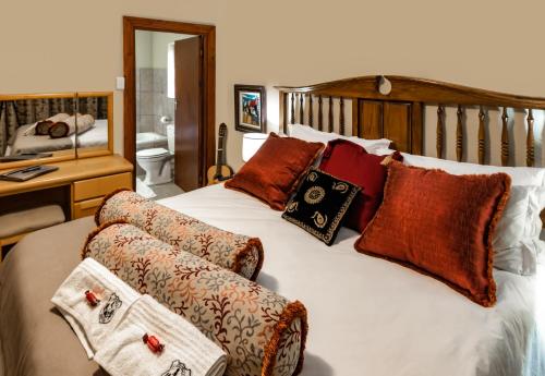 Postel nebo postele na pokoji v ubytování Antiqua Cottage