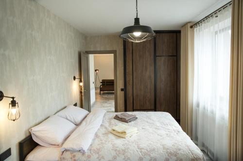 Postel nebo postele na pokoji v ubytování Elite Loft Apart