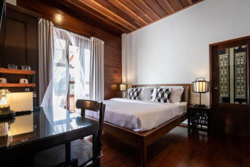 Letto o letti in una camera di Punyashthiti villa