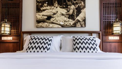 Letto o letti in una camera di Punyashthiti villa