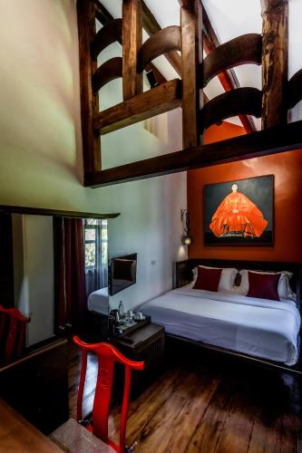 Letto o letti in una camera di Punyashthiti villa