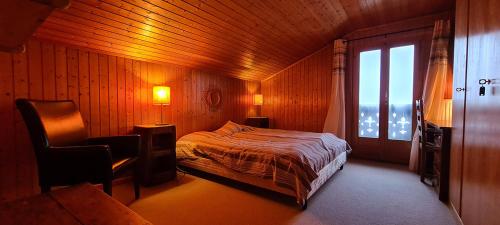 Postel nebo postele na pokoji v ubytování Chalet Brimborion