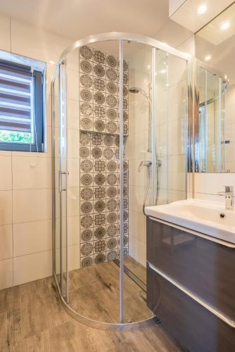 Ένα μπάνιο στο Apartamenty Wellness & SPA Cztery Pory Roku