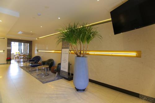 TV a/nebo společenská místnost v ubytování Suncheon Hotel Gite