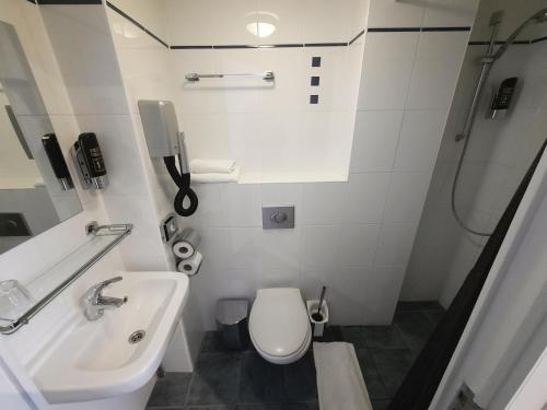 Koupelna v ubytování Hotel Washington