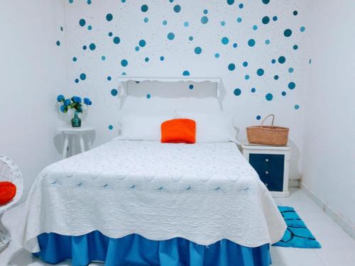 Hostal Solsticio Guajiroにあるベッド