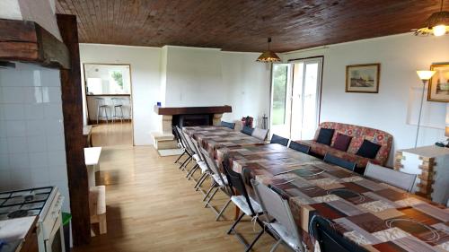 a large room with a long table and chairs at Maison de 7 chambres a Eyrein avec jardin amenage et WiFi in Eyrein