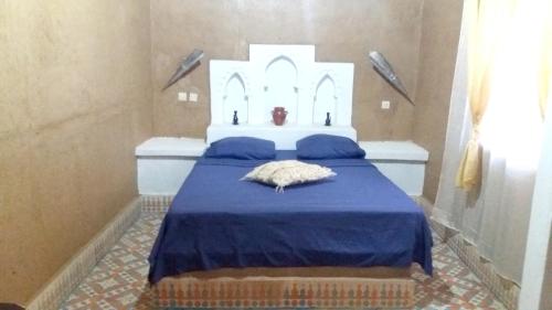 Katil atau katil-katil dalam bilik di 4 bedrooms house with city view furnished terrace and wifi at Hassilabied