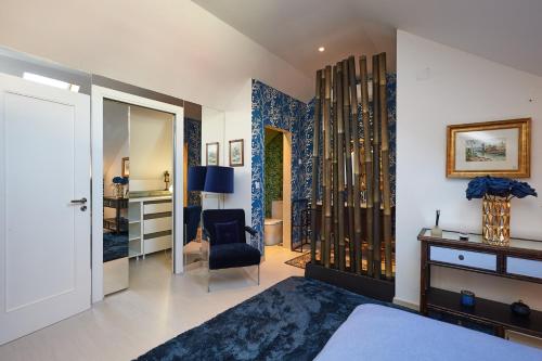 Ένα ή περισσότερα κρεβάτια σε δωμάτιο στο Spacious apartment in Estoril with private garden, 120 m²