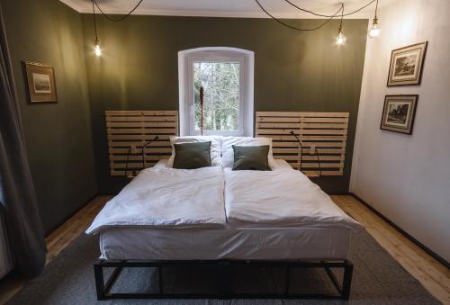 Tempat tidur dalam kamar di Zum G'Leut
