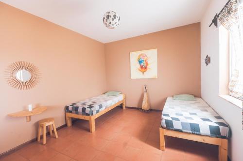 Postel nebo postele na pokoji v ubytování Casa Tabanka Apartment