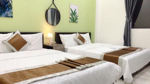 Fotografie z fotogalerie ubytování HOA MAI Plus Hostel v destinaci Ðồng Hới