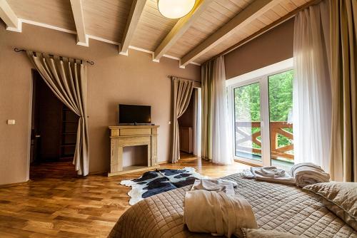 Postel nebo postele na pokoji v ubytování Olga Deluxe