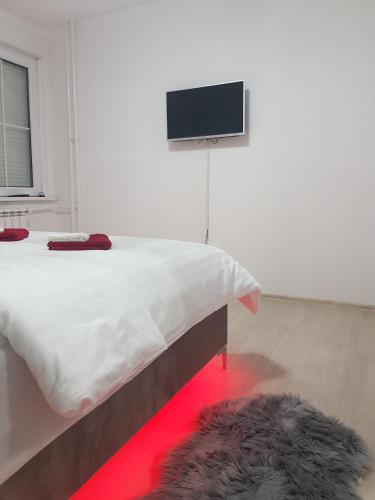 Apartman Akik 2にあるテレビまたはエンターテインメントセンター