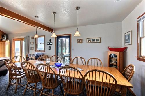 a dining room with a table and chairs at Fishin' Friendzy #41-B in Buxton