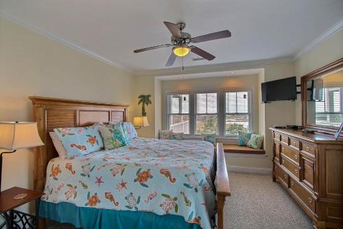 a bedroom with a bed and a ceiling fan at Hwy 12 Slash Creek in Hatteras