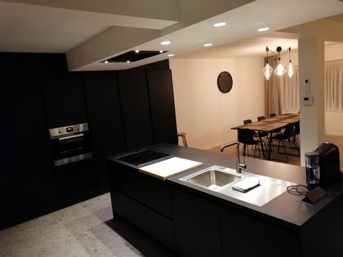 Køkken eller tekøkken på appartement deluxe Orly 2