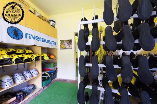 a room filled with lots of shoes at Penzion Black Sheeps Adventures in Wildalpen