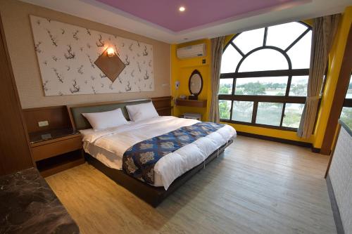Cama o camas de una habitación en Jinsa Lakeside View Resort