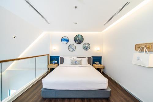 Postel nebo postele na pokoji v ubytování Kram Pattaya