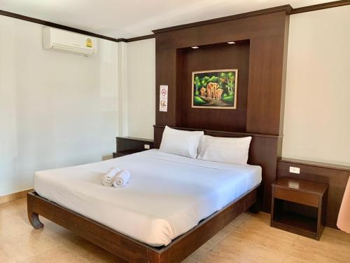 Кровать или кровати в номере sp chaweng palace