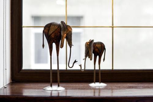 a figurine of an elephant standing in front of a window at Zoloto Karpat in Stryi