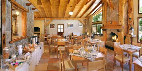 En restaurant eller et andet spisested på Cabañas Aufenthalt