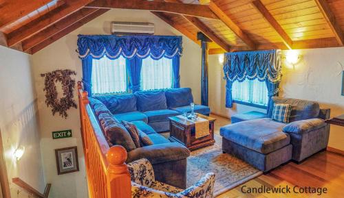 Zona de estar de Observatory Cottages