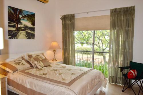 Postel nebo postele na pokoji v ubytování 3BR Apt @CadaquesCaribe Bayahibe