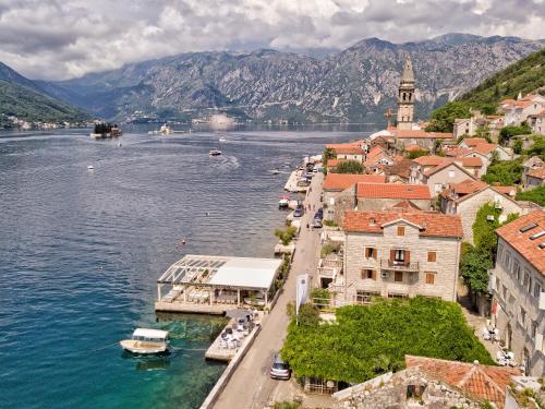 an aerial view of a town on a body of water at Hotel Admiral in Perast