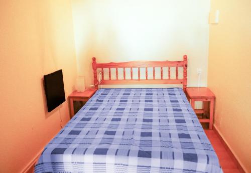 Een bed of bedden in een kamer bij Kione Sapporo