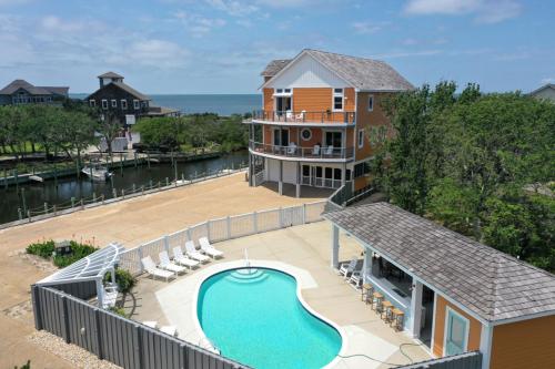 an aerial view of a house with a swimming pool at The Love Boat #15SV-F in Frisco