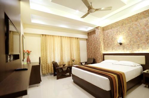Katil atau katil-katil dalam bilik di Hotel Deepam