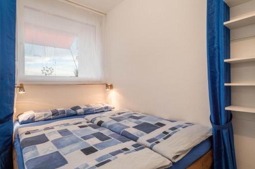 Кровать или кровати в номере Ferienwohnung Förster
