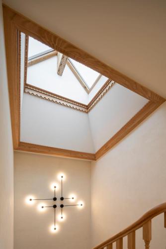 a skylight in a room with a ceiling at NORO Plaza in A Coruña