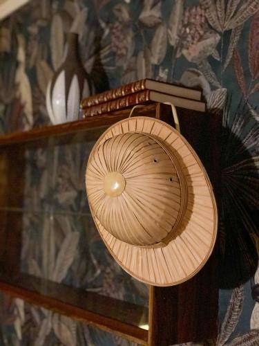 a wooden umbrella on top of a shelf at Villa Bergli in Malung