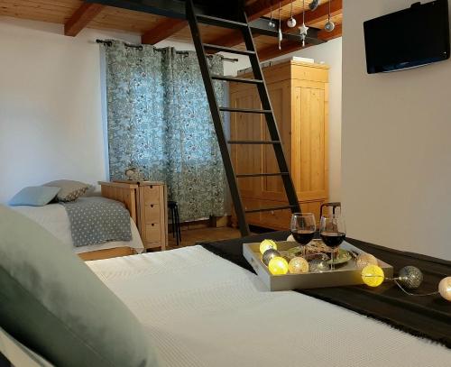 Postel nebo postele na pokoji v ubytování Agriturismo Podere Bedin