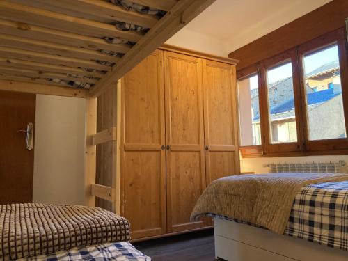 Llit o llits en una habitació de Vistas Únicas a los Pirineos, para 7-8 personas!! Tensi Home Llivia