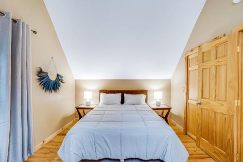 Ένα ή περισσότερα κρεβάτια σε δωμάτιο στο Hideaway Chalet