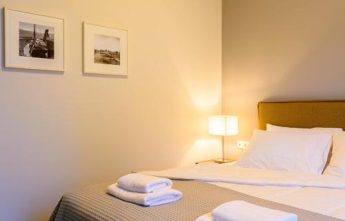 Ένα ή περισσότερα κρεβάτια σε δωμάτιο στο Elounda Colour Apartments