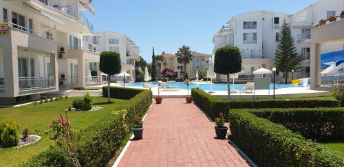 The swimming pool at or close to Antalya belek 4 nirvana club first floor two bedrooms pool view with water slide close to center - belek beach park
