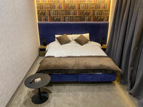 Postel nebo postele na pokoji v ubytování Kuprin Hotel