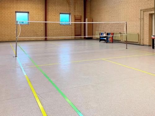 a gymnasium with a volleyball court with a net at 20 person holiday home in Silkeborg in Silkeborg