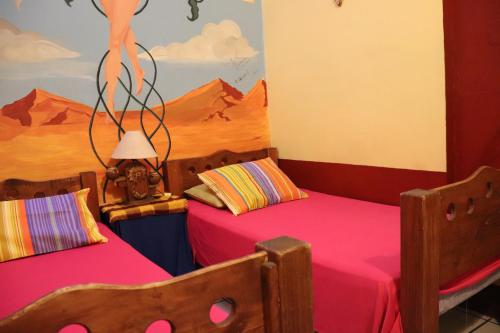 Una cama o camas en una habitación de Hostel Casa Zalaoui