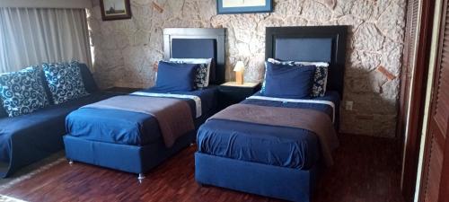 Cama o camas de una habitación en Habitación amplia cerca de Andares