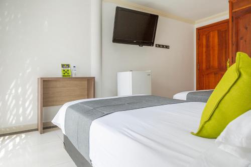 Katil atau katil-katil dalam bilik di Hotel Boutique Laureles Home - Ayenda 1258