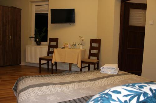 Ένα ή περισσότερα κρεβάτια σε δωμάτιο στο PIANO CAFE b&b
