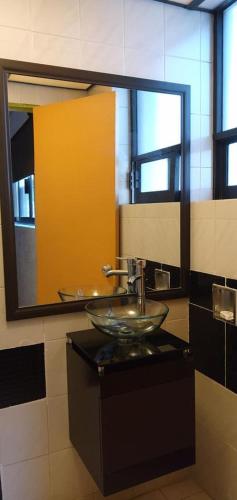 a bathroom with a sink and a mirror at Hotel Gilbert in Mexico City