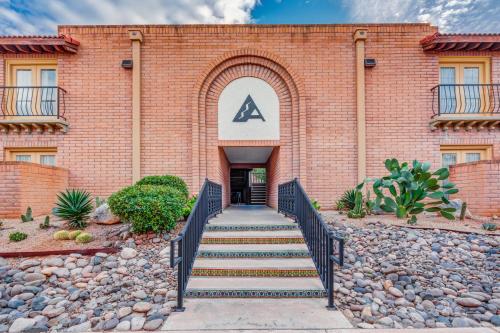 a brick building with a letter a on it at Clarion Inn in Sierra Vista