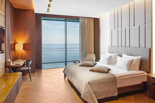 Katil atau katil-katil dalam bilik di Ricosta Hotel